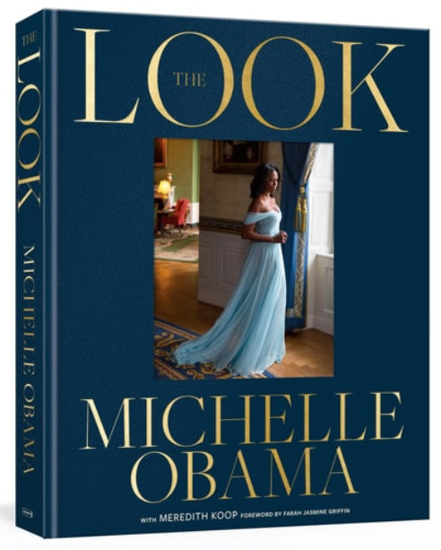 Book titled 'The Look' by Michelle Obama with a photo of a woman in a blue dress on the cover.