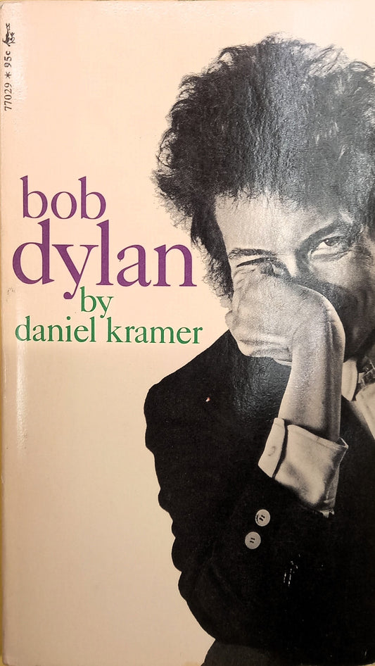 Cover of the book 'Bob Dylan: A Biography' by Daniel Kramer, featuring a black and white photograph of Bob Dylan with a white background.