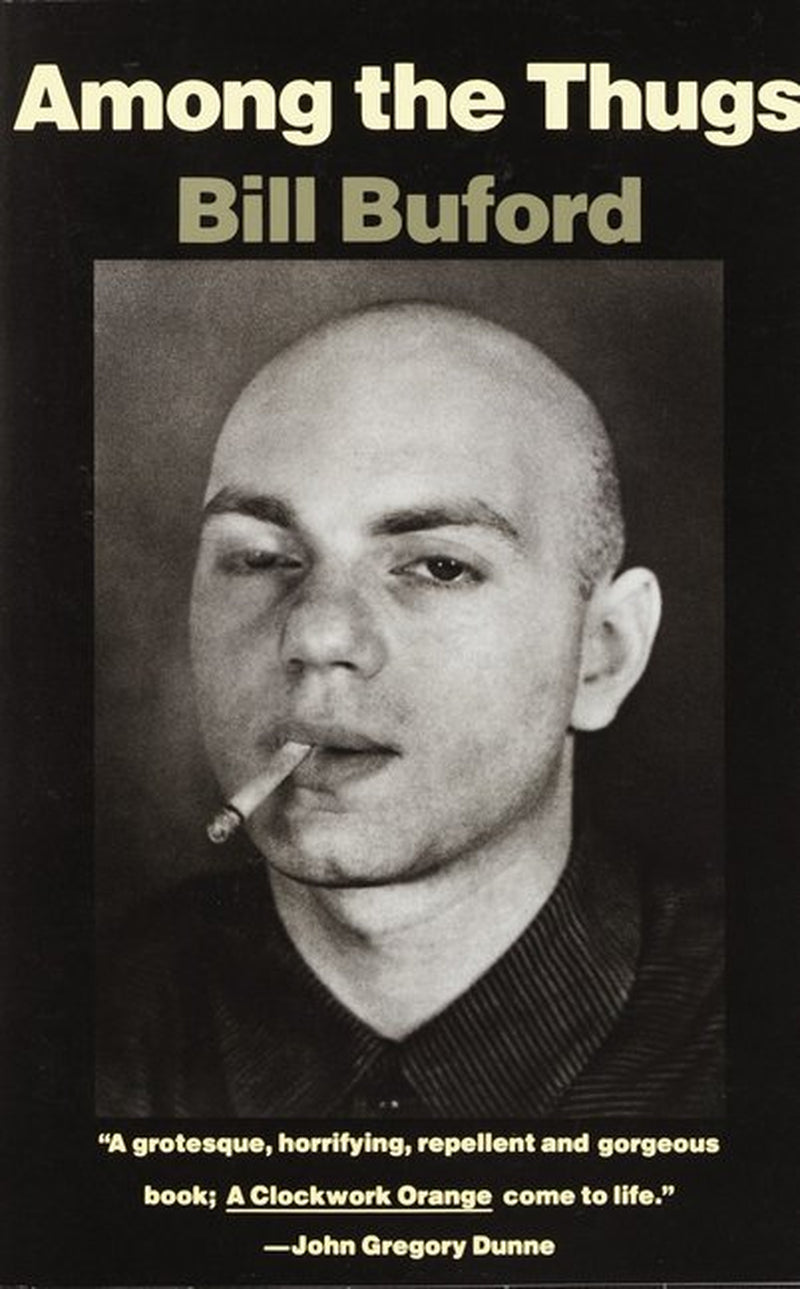 Book front cover of book 'Among the Thugs [ISBN: 9780679745358]' by Bill Buford, featuring a man with a shaved bald head smoking a lit cigarette. 