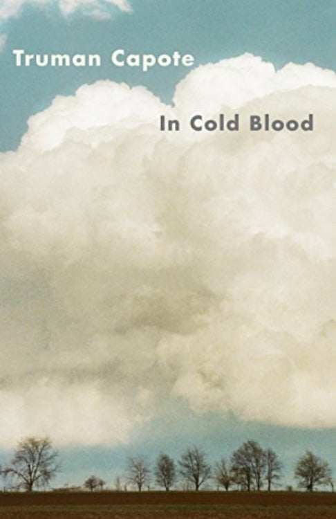 Book cover of 'In Cold Blood' by Truman Capote with a cloudy sky and trees in the background.