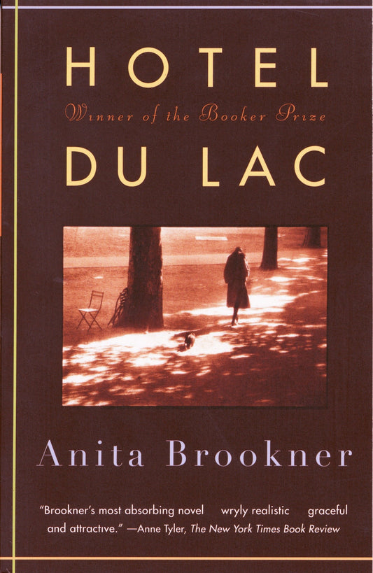 Book cover of 'Hotel du Lac' by Anita Brookner, featuring a dark brown background with gold title text, a central sepia-toned photograph of a person walking in a park, and white author text at the bottom.