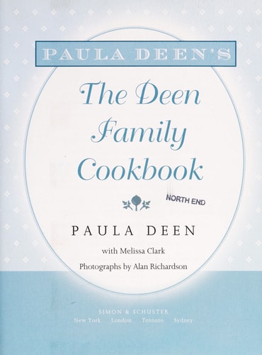 Book cover of 'The Deen Family Cookbook' by Paula Deen with a light blue background and circular design.