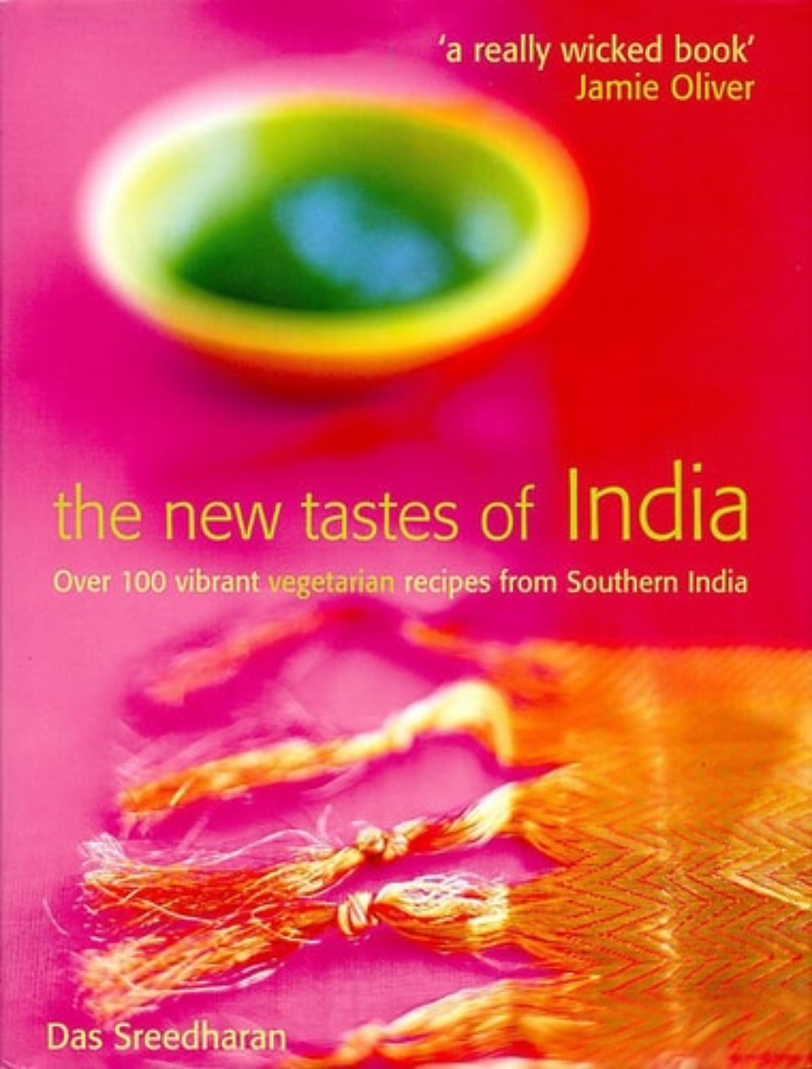 Book cover of 'The New Tastes of India' with vibrant colors and text.
