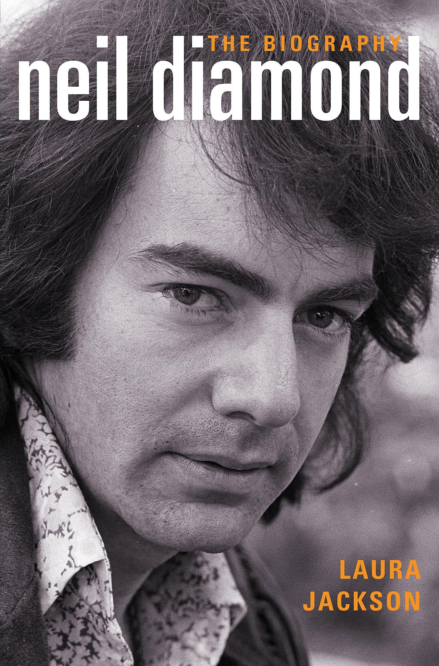 Book cover of 'Neil Diamond: The Biography' by Laura Jackson, featuring a black and white portrait of Neil Diamond.