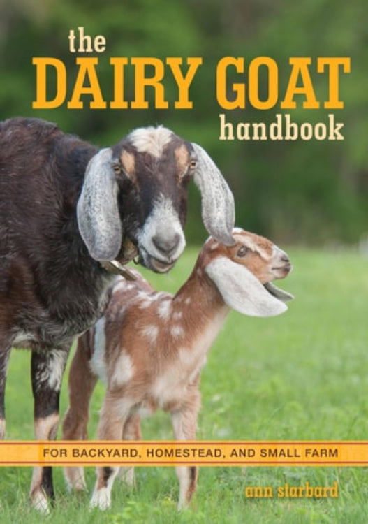 The cover of 'The Dairy Goat Handbook' featuring an image of a adult goat and a kid goat in an outdoor setting.