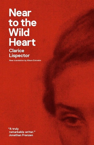 Book cover of 'Near to the Wild Heart' by Clarice Lispector with a red background and text.