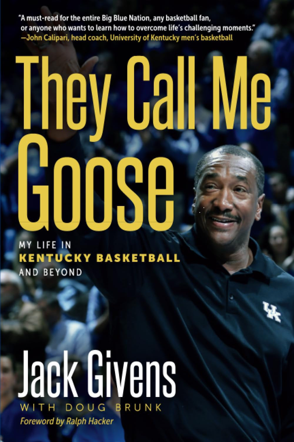 Book cover for 'They Call Me Goose: My Life in Kentucky Basketball and Beyond' by Jack Givens with Doug Brunk, featuring a smiling basketball player in a black Kentucky polo against a dark crowd background, with large yellow title text and white subtitle text.
