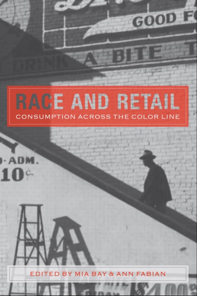 Book cover of 'Race and Retail: Consumption Across the Color Line' by Mia Bay and Ann Fabian, with a silhouette of a person on a building.
