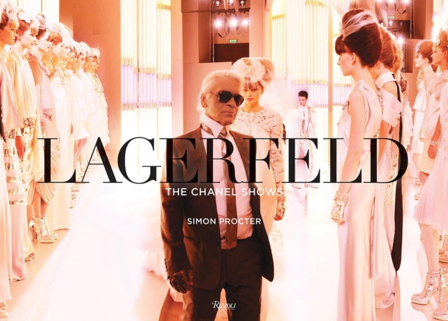 Book cover of 'Lagerfeld: The Chanel Shows' with Karl Lagerfeld and models in a fashion show setting.