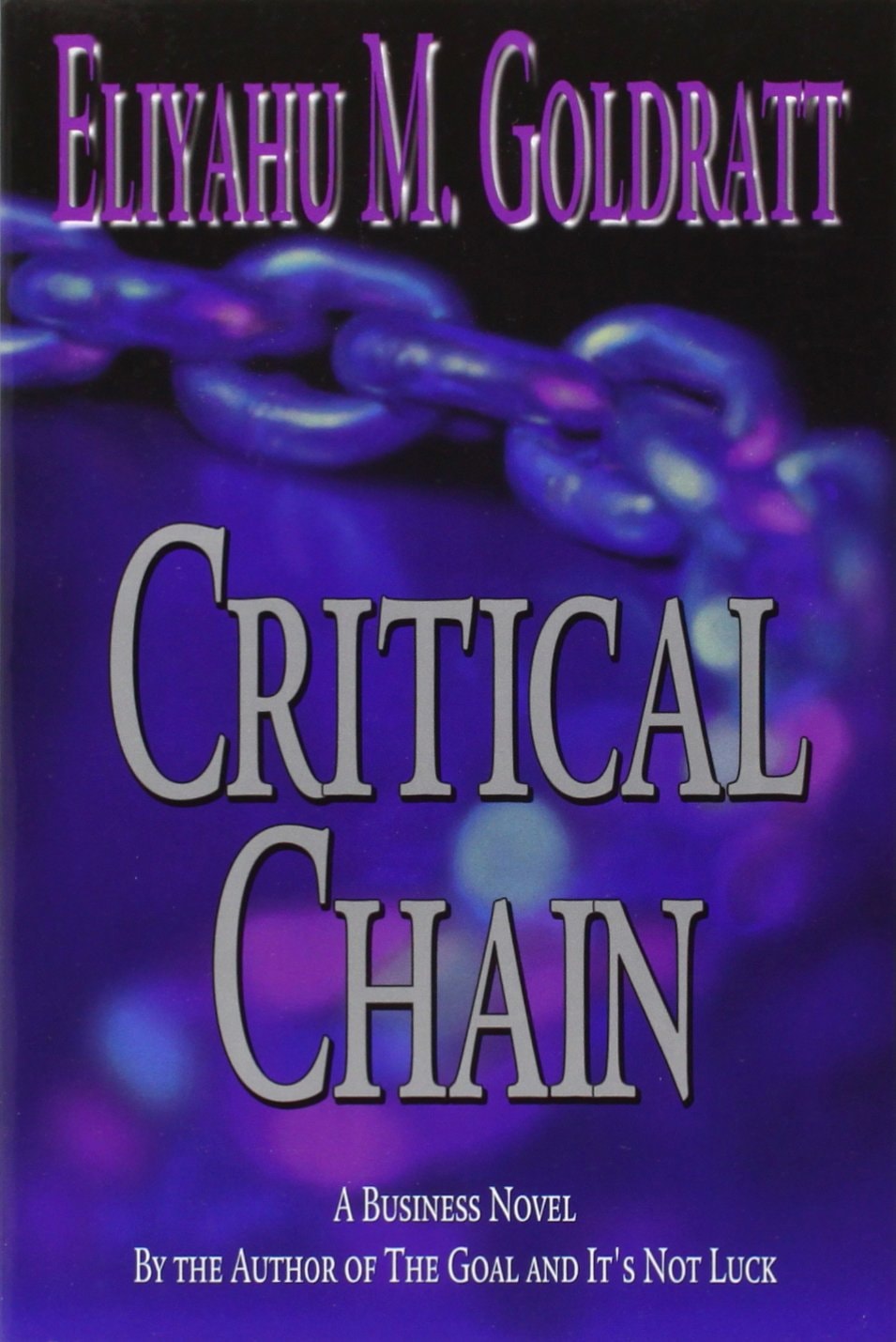Book cover of 'Critical Chain' by Eliyahu M. Goldratt with a purple chain design.