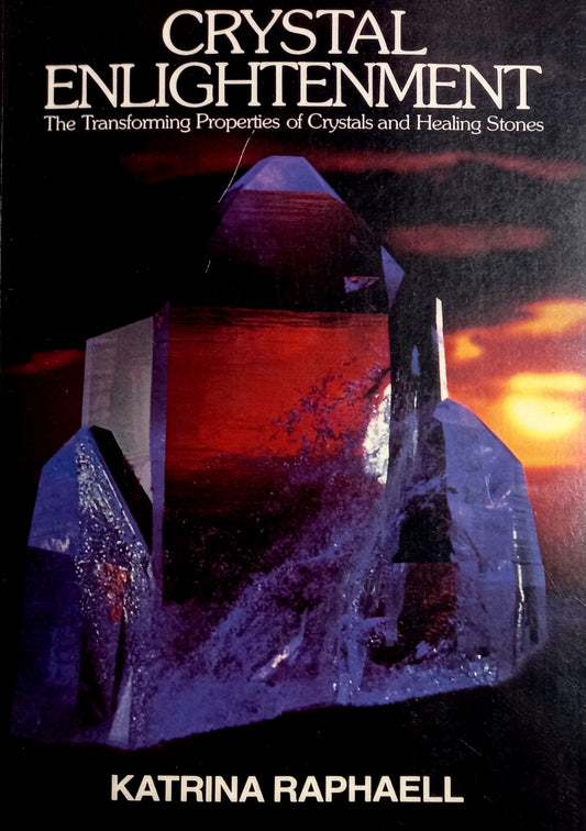 Book front cover of the book 'Crystal Enlightenment' by Katrina Raphaell features a close-up image of a crystal with a dark background, emphasizing the crystal's natural patterns and colors.