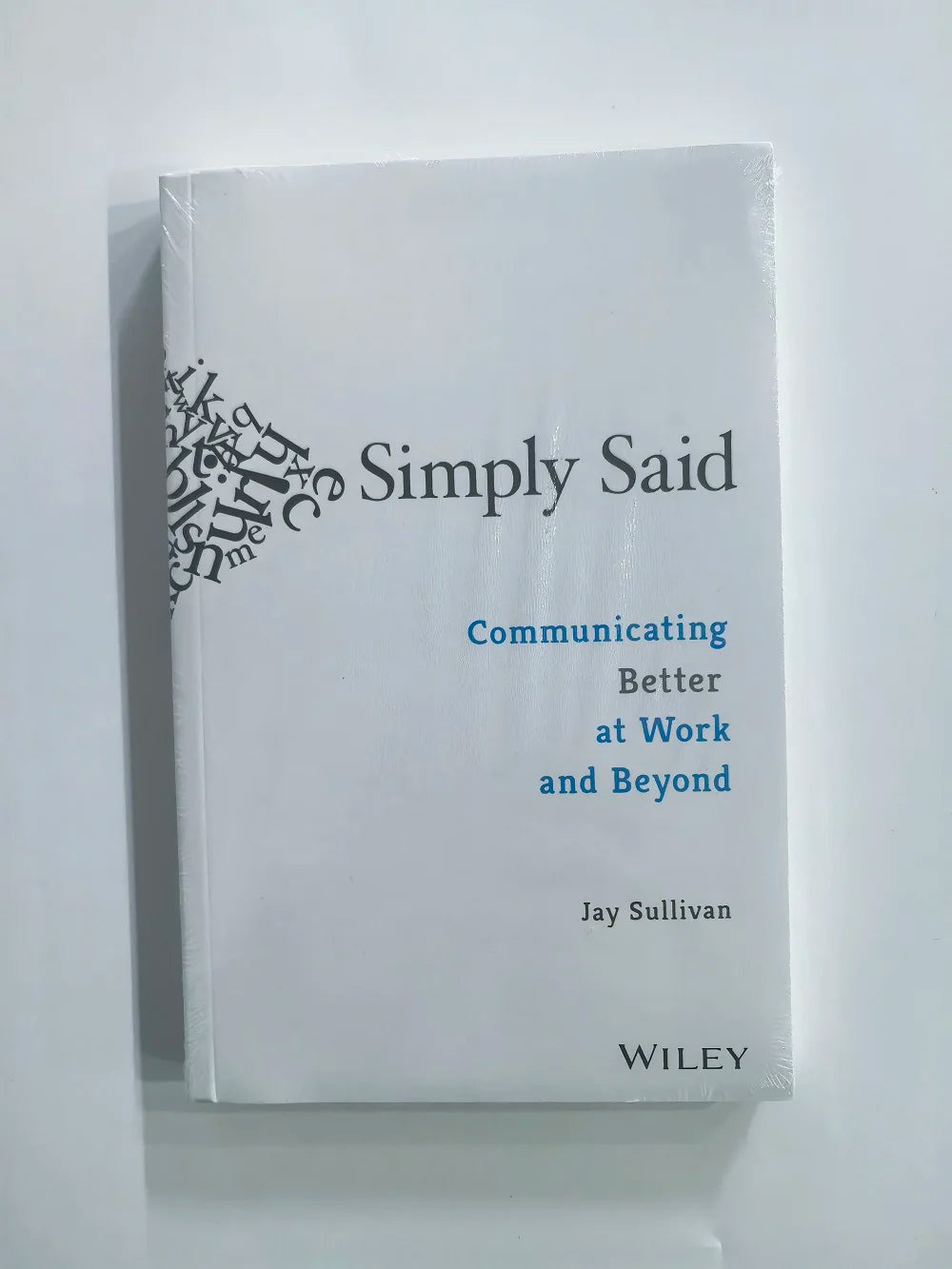 Book titled 'Simply Said: Communicating Better at Work and Beyond' by Jay Sullivan on a white background