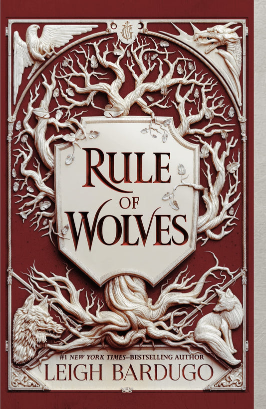 Book cover of 'Rule of Wolves' by Leigh Bardugo with decorative elements and tree design.