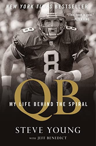 Book cover of 'QB: My Life Behind the Spiral' by Steve Young with a football player in uniform.