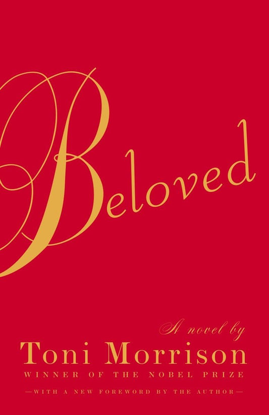 This image features the cover of "Beloved," a Pulitzer Prize-winning novel by Toni Morrison. The cover design is minimalist, utilizing a bold red background with the title "Beloved" written in elegant, golden cursive font.