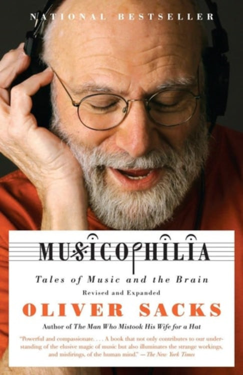 The image displays the cover of 'Musicophilia: Tales of Music and the Brain, Revised and Expanded Edition' by Oliver Sacks. The cover features a photo of an older Oliver Sacks, with glasses and a beard, looking thoughtfully off to the side.