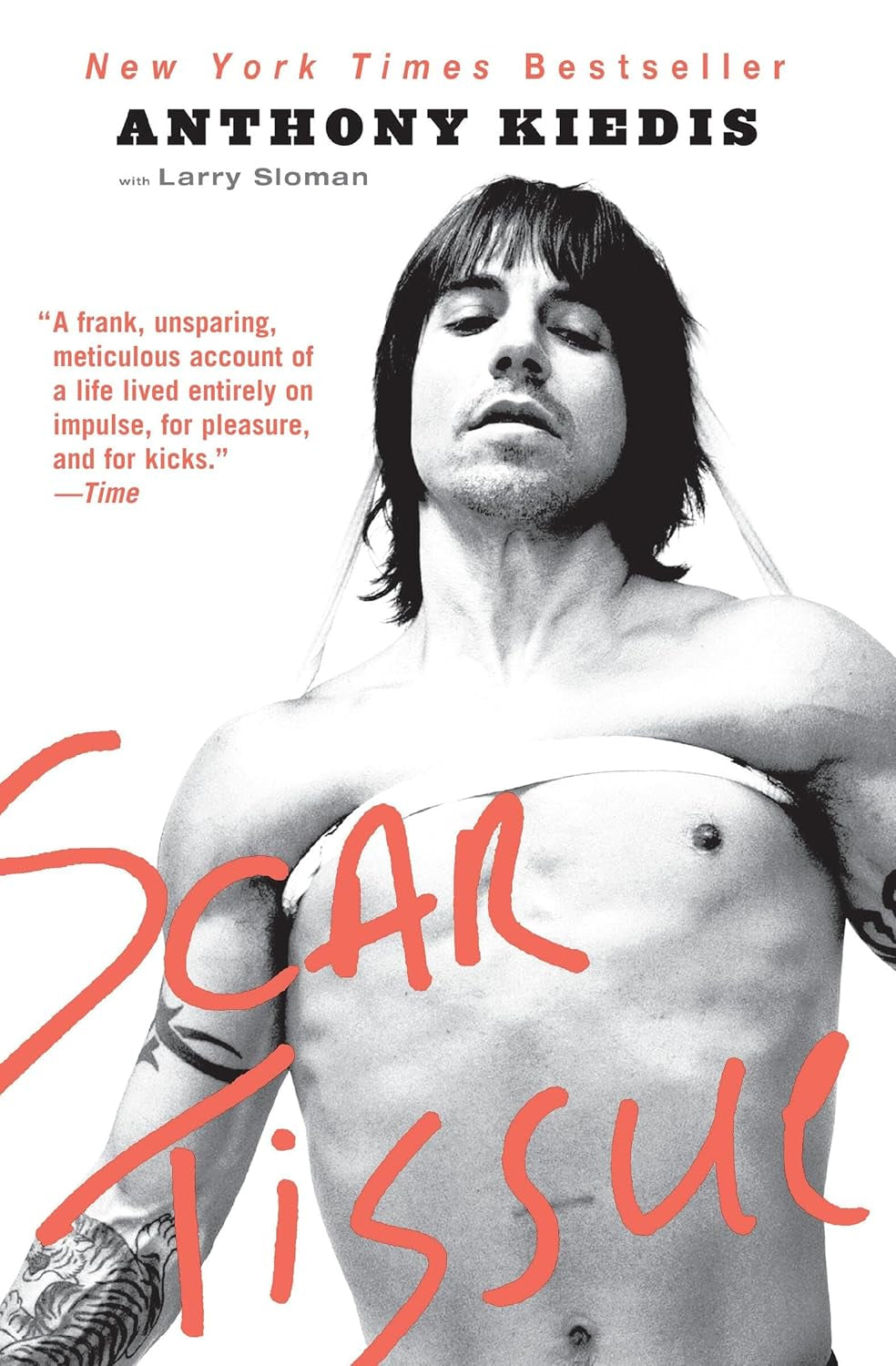 This image features the cover of the book "Scar Tissue" by Anthony Kiedis & Larry Sloman. The cover displays a monochrome photograph of Anthony Kiedis, capturing his intense and expressive gaze.