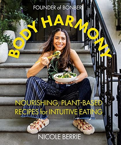 Book cover of 'Body Harmony' by Nicole Berrie featuring a woman eating outdoors.