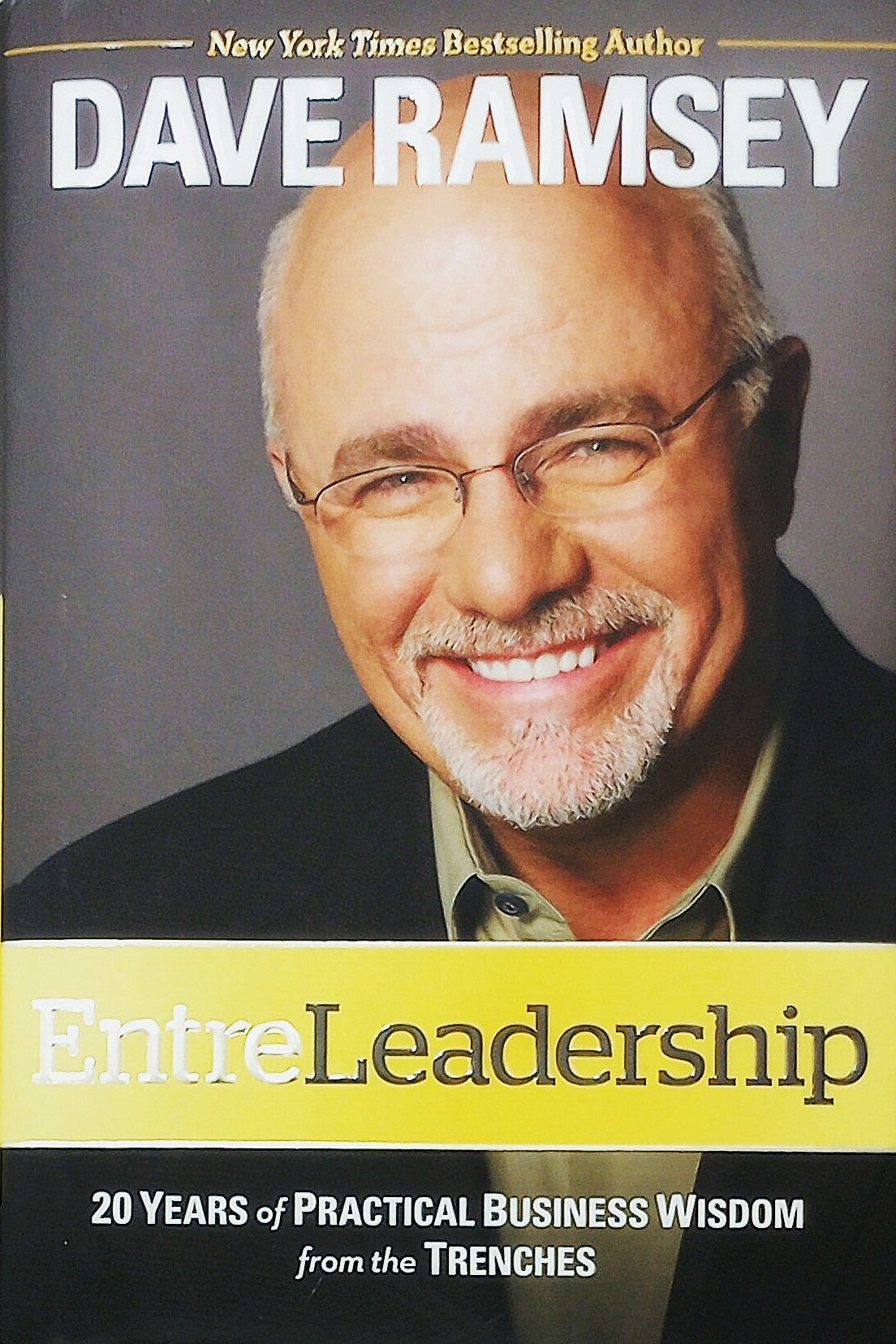 Book cover featuring Dave Ramsey with text about 'EntreLeadership' and his business wisdom.