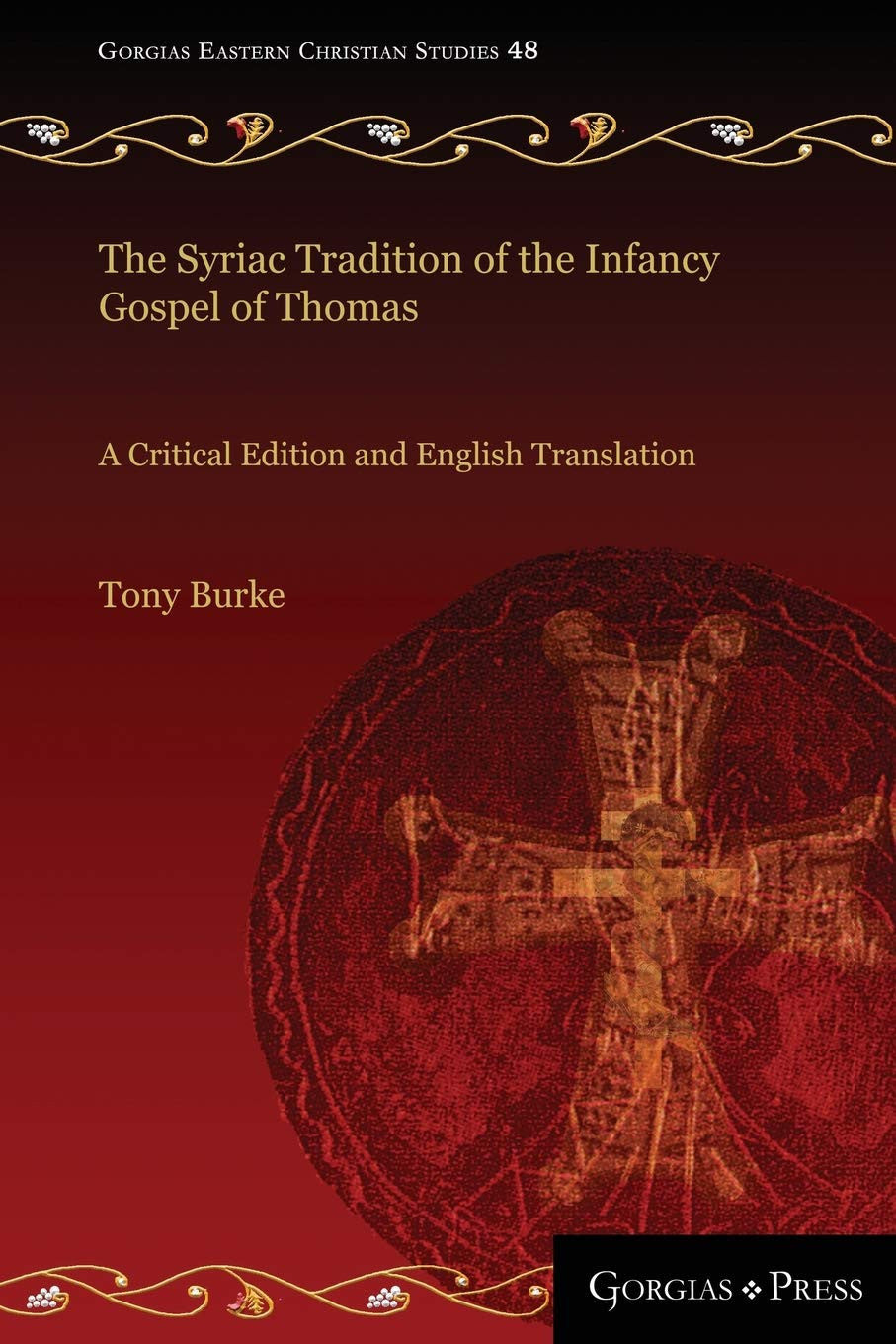 Book cover for 'The Syriac Tradition of the Infancy Gospel of Thomas: A Critical Edition and English Translation' by Tony Burke, published by Gorgias Press. The cover features a dark red background with gold decorative flourishes and a large circular red-and-gold illustration of a cross.