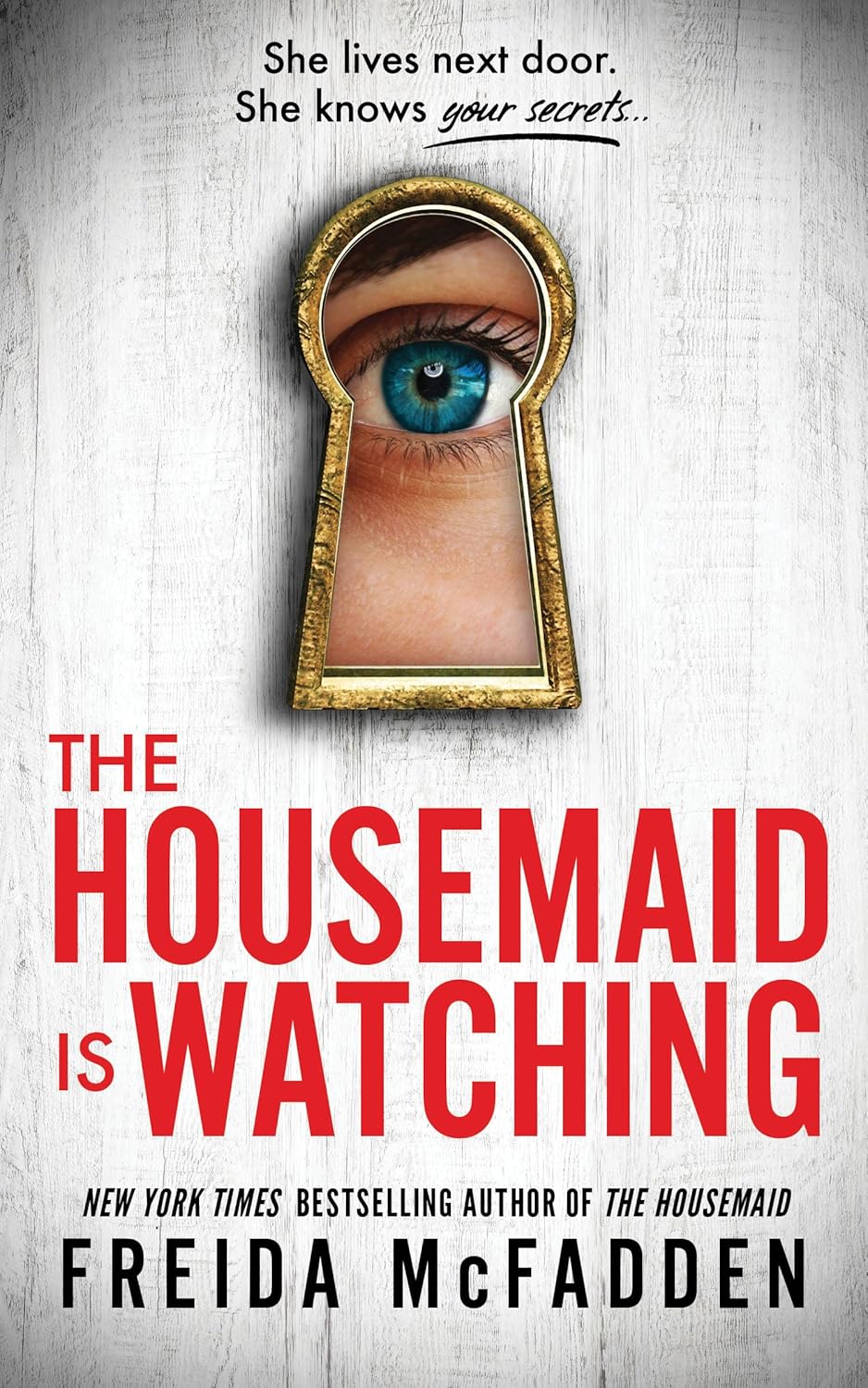 Book cover of 'The Housemaid is Watching' with a keyhole design and eye illustration.