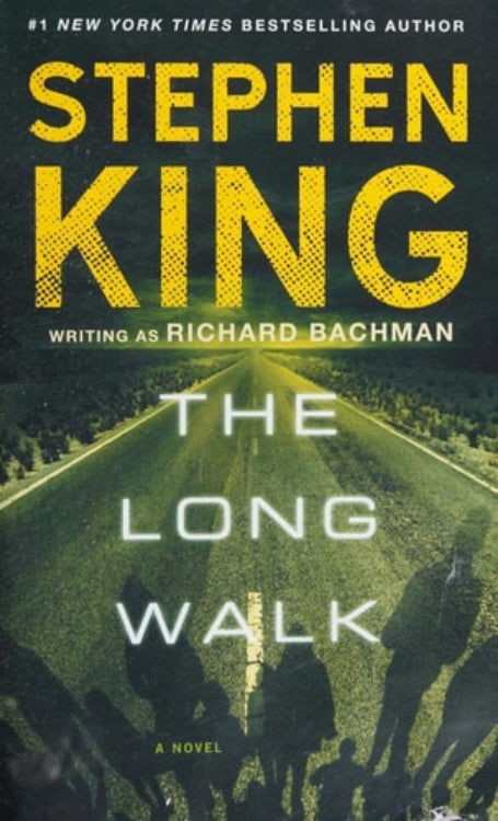 The cover of the book 'The Long Walk: A Novel' by Stephen King (Richard Bachman), featuring a road with a tail light and the title in bold letters.