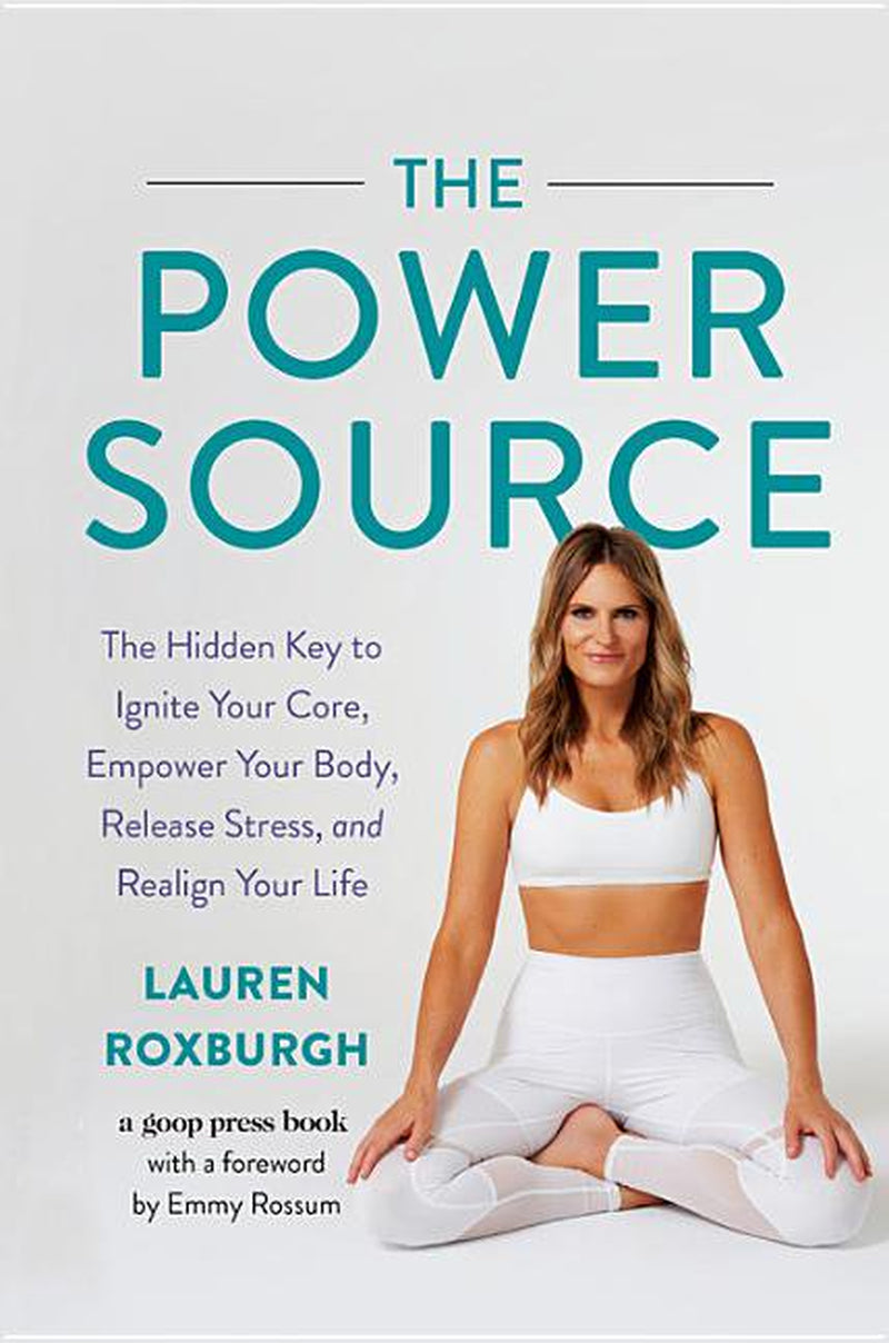 The cover of the book 'The Power Source' by Lauren Roxburgh features a white-colored book with a subtitle that reads 'The Hidden Key to Ignite Your Core, Empower Your Body, Release Stress, and Realign Your Life'. The author's photo is at the top, and there's a blurred image of a woman sitting in a yoga pose in the background.