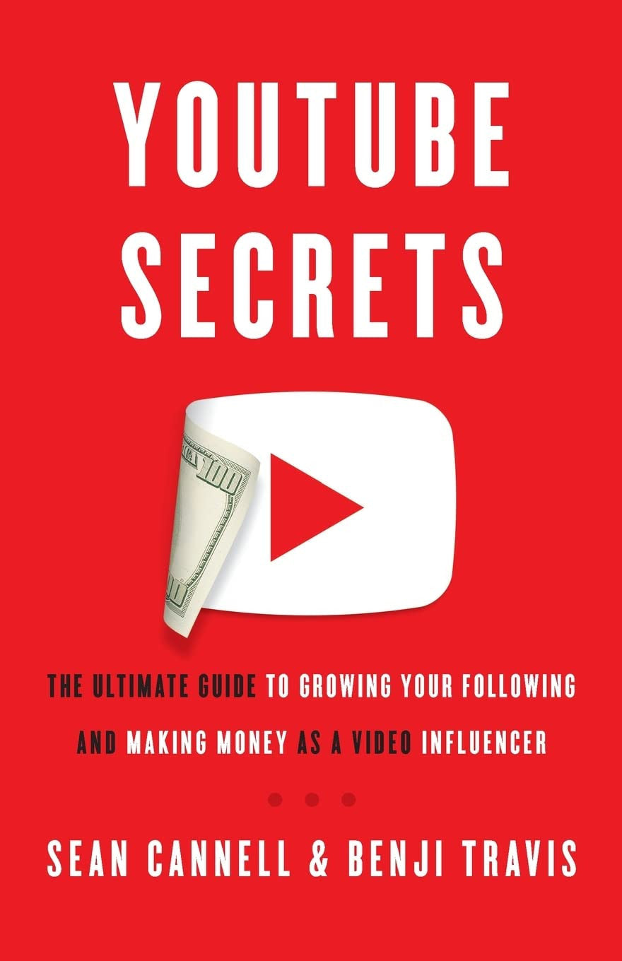 Book cover of 'YouTube Secrets' with a red background and YouTube logo folding out to be a $100 USD dollar bill note.