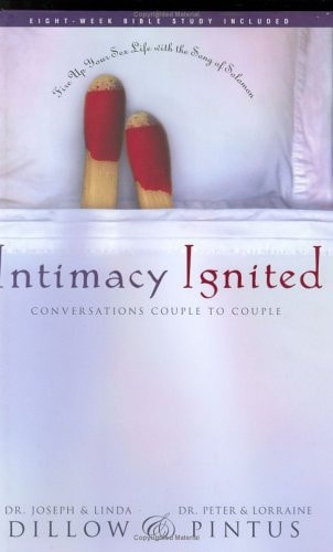 Book cover of 'Intimacy Ignited' with two socks on a bed