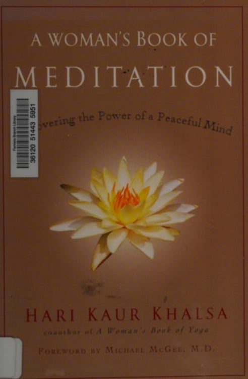 The cover of 'A Woman's Book of Meditation: Discovering the Power of a Peaceful Mind' by Hari Kaur Khalsa, featuring a lotus flower and a barcode.