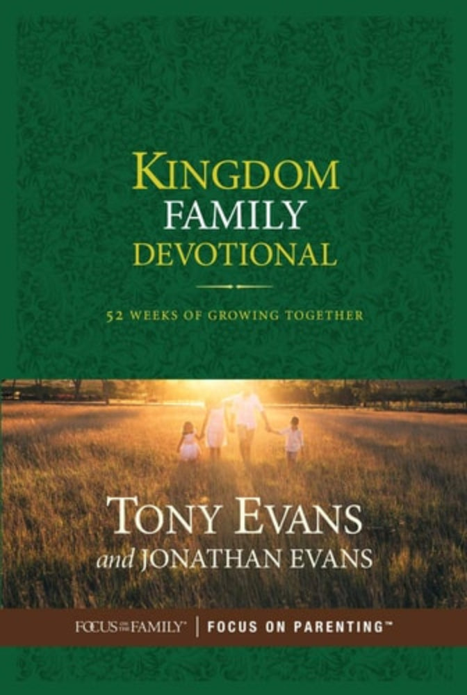 Cover of the 'Kingdom Family Devotional: 52 Weeks of Growing Together' by Tony Evans and Jonathan Evans, featuring an image of a family walking in a field at sunset.