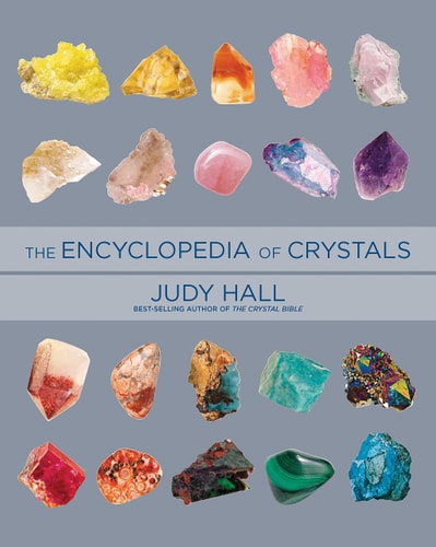 Book cover of 'The Encyclopedia of Crystals' by Judy Hall with images of various crystals.