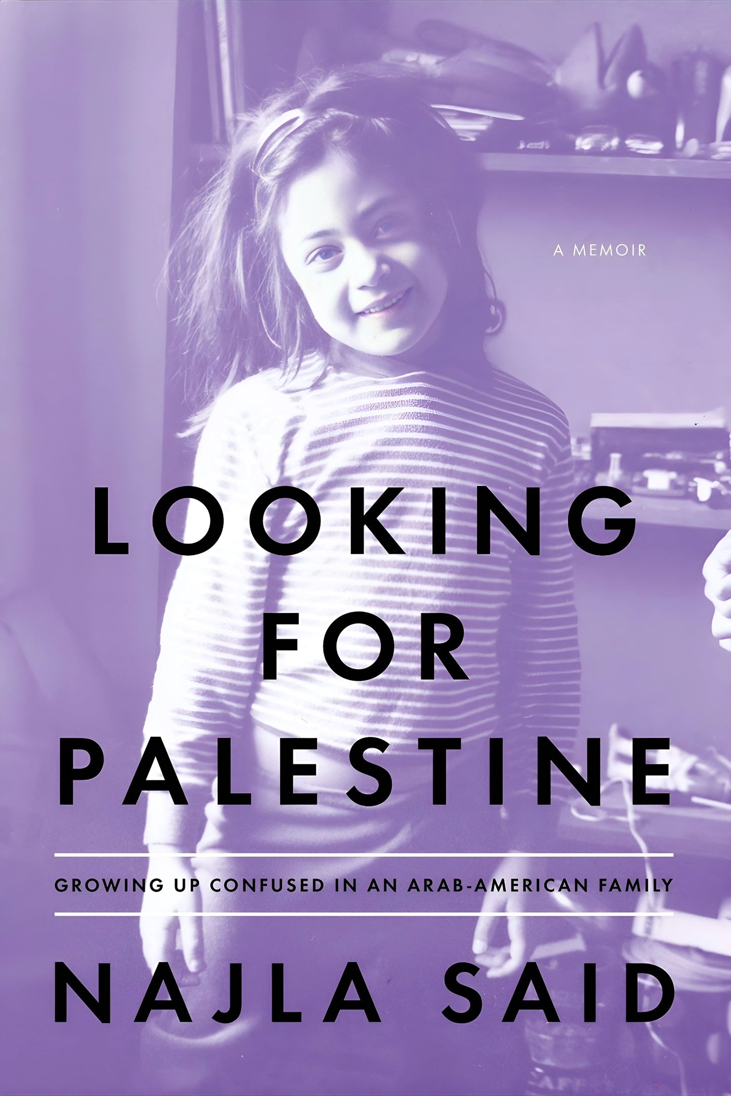 This image features the cover of the memoir "Looking for Palestine: Growing Up Confused in an Arab-American Family [ISBN: 9781594487088]" by Najla Said. The cover design is simple yet striking, with a muted purple background that highlights the title in bold white letters.
