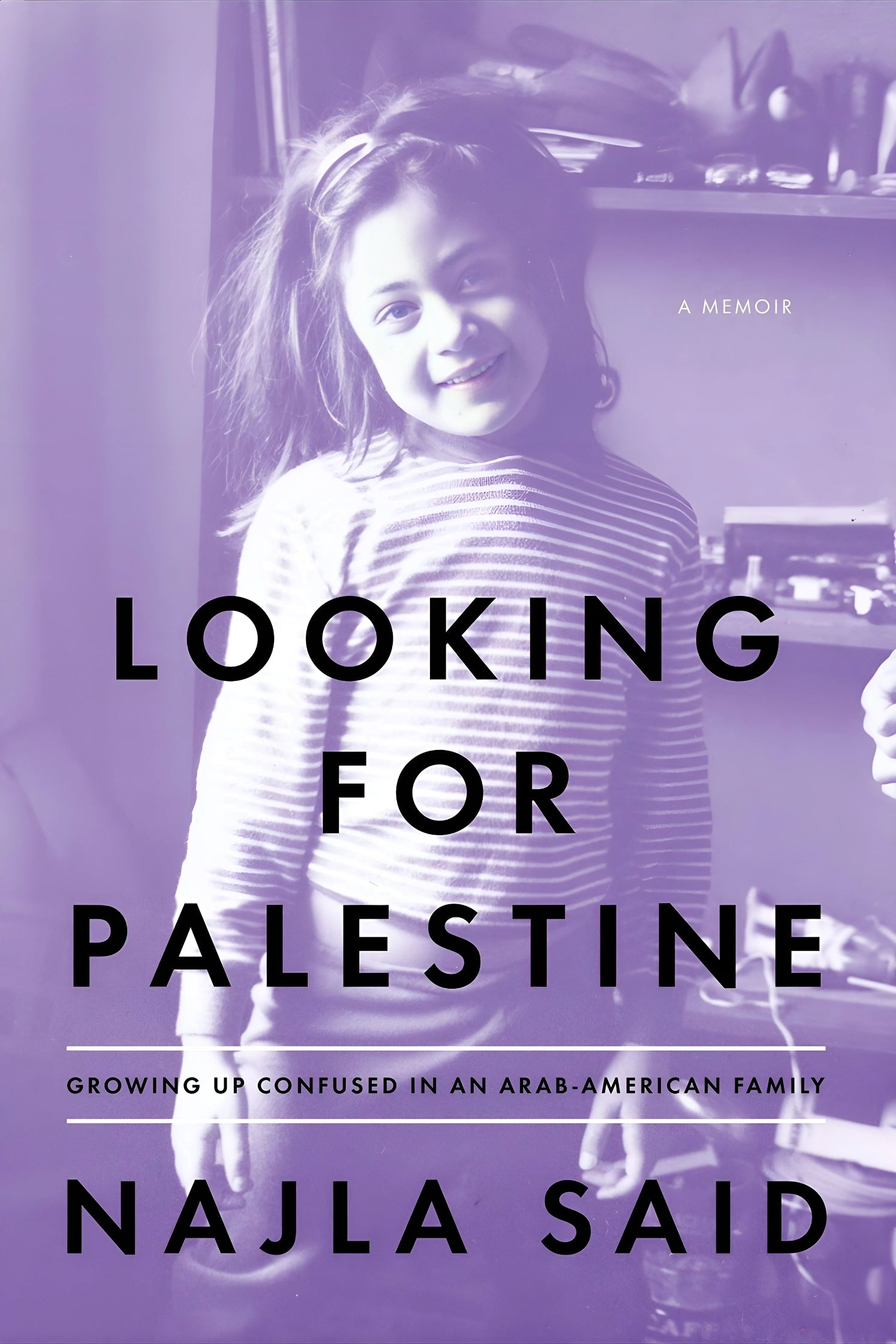This image features the cover of the memoir "Looking for Palestine: Growing Up Confused in an Arab-American Family [ISBN: 9781594487088]" by Najla Said. The cover design is simple yet striking, with a muted purple background that highlights the title in bold white letters.