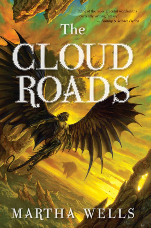 Book cover of 'The Cloud Roads' by Martha Wells with a dragon and fiery background.