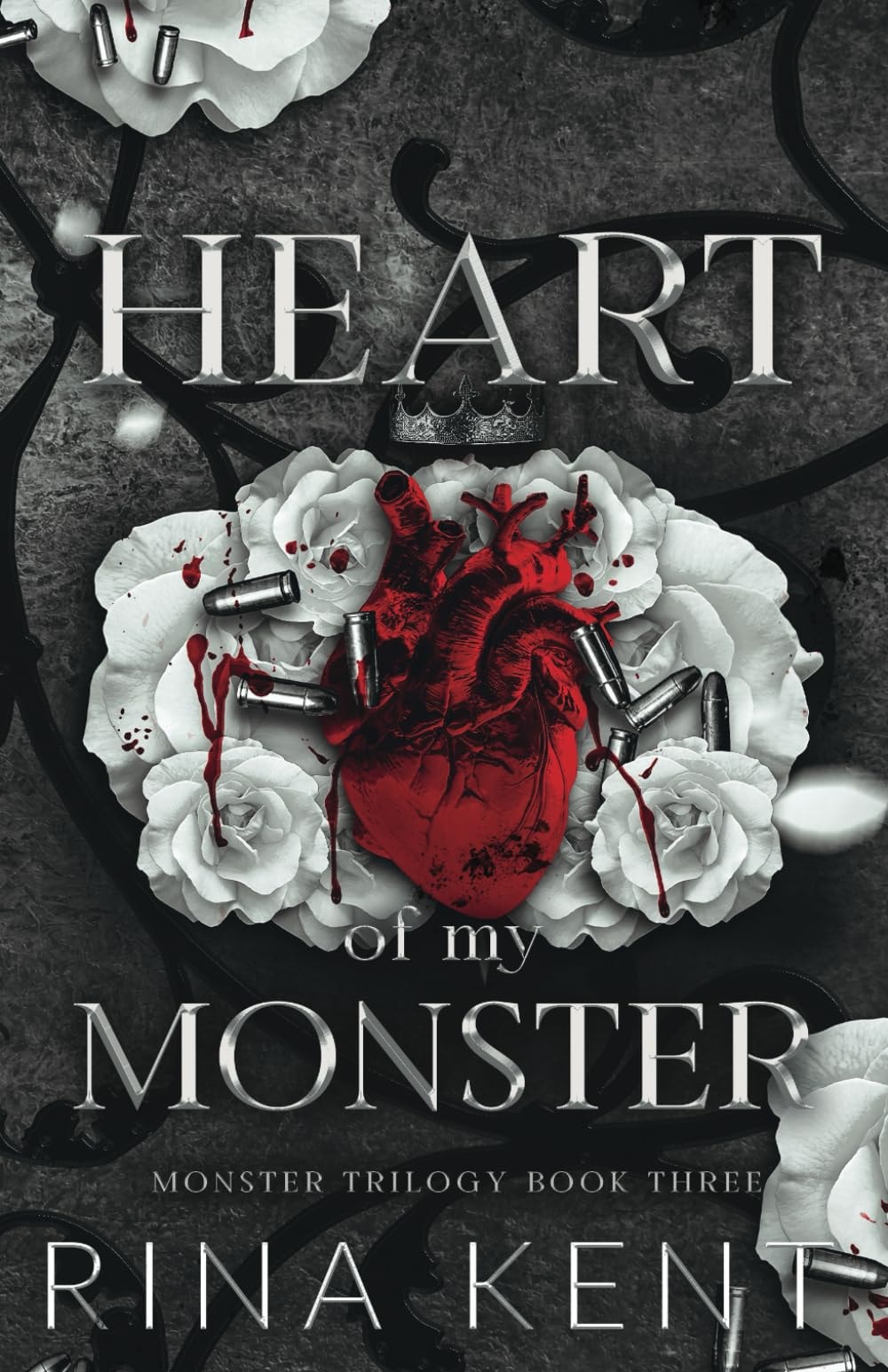 Book cover of 'Heart of my Monster' with a heart and roses design.
