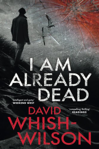 Book cover of 'I Am Already Dead' by David Whish-Wilson with a silhouette of a man and woman, and a cracked glass effect.