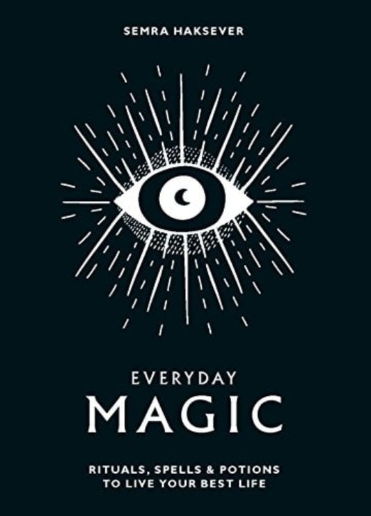 Book cover of 'Everyday Magic: Rituals, Spells & Potions to Live Your Best Life' featuring a stylized eye with rays and text.
