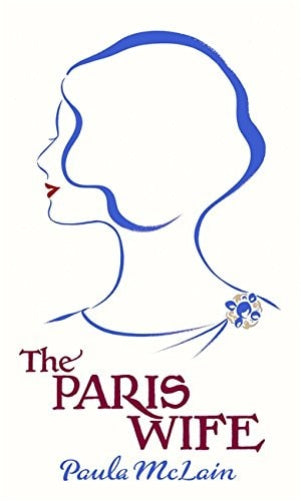 Book cover of 'The Paris Wife' by Paula McLain with a blue silhouette of a woman's head and a brooch.