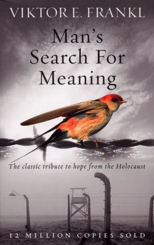 Book cover of 'Man's Search for Meaning' by Viktor E. Frankl featuring a bird perched on a fence near a concentration camp, with a dark sky in the background.