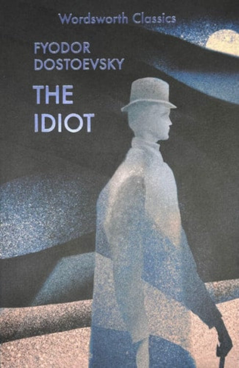 Cover of 'The Idiot' by Fyodor Dostoevsky featuring a silhouette of a man in a hat against a backdrop with a train and a moonlit sky.