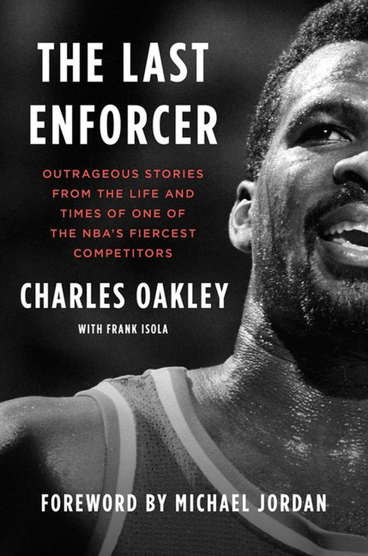 The cover of the book 'The Last Enforcer: Outrageous Stories From the Life and Times of One of the NBA's Fiercest Competitors' featuring a black and white image of Charles Oakley, a former NBA player, with a foreword by Michael Jordan.