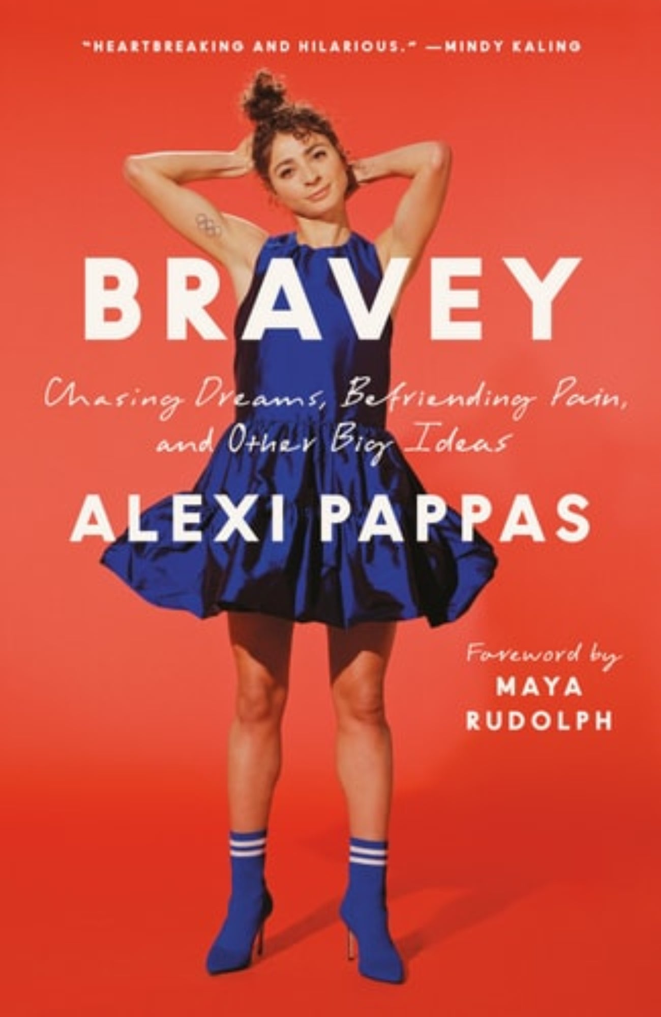 Book cover of 'Bravery: Chasing Dreams, Befriending Pain, and Other Big Ideas' by Alexi Pappas with a person in a blue dress on a red background.