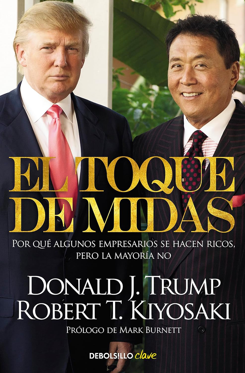 Book cover of 'El Toque de Midas' by Robert Kiyosaki & Donald Trump, featuring the two authors posing together on the cover in suits.