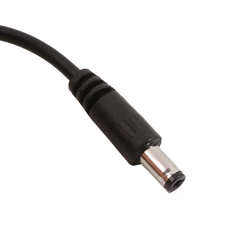 Black DC power cable connector on a white background