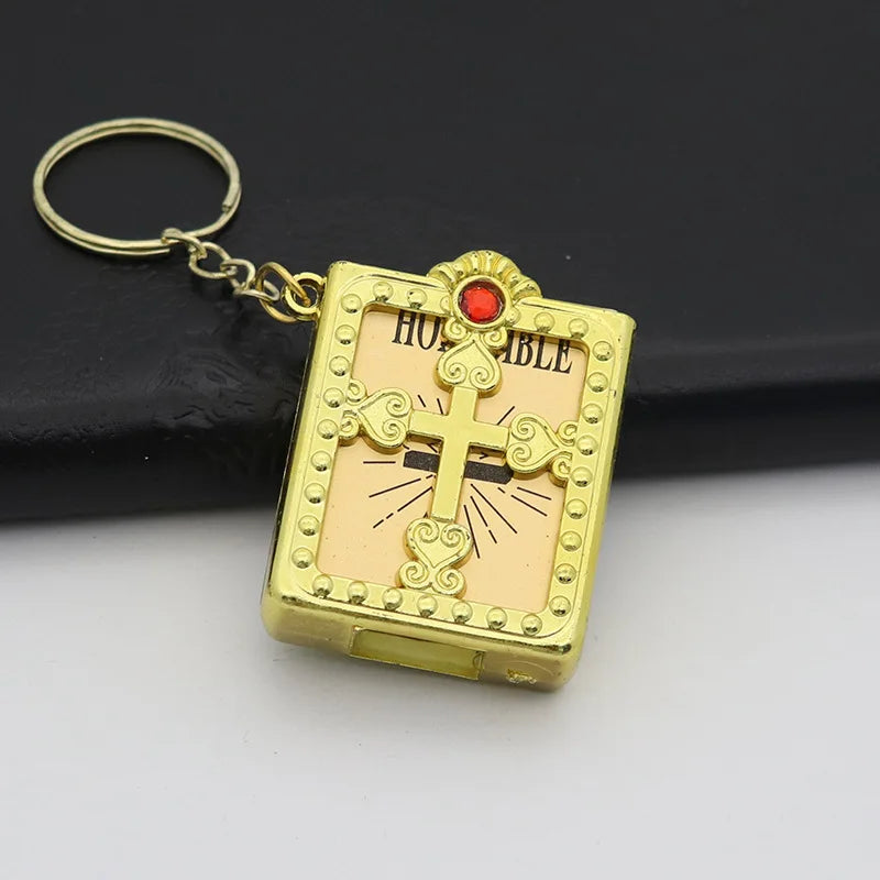 Mini gold-tone Holy Bible keychain pendant with jewel embellishments