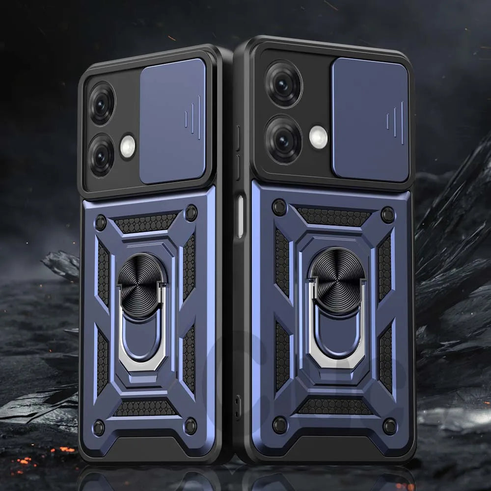 Two blue and black phone cases with a metallic ring holder on a dark background