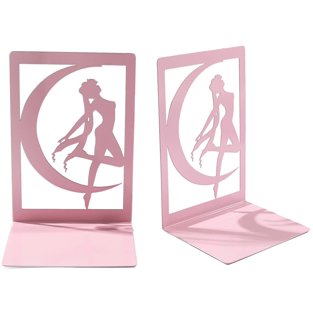 Pink metal bookends with a woman's silhouette design on a white background