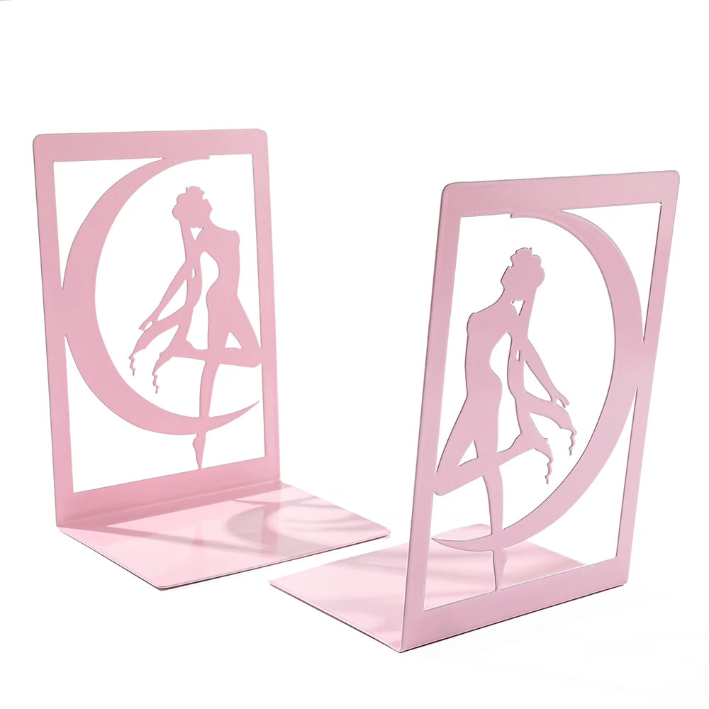 Pink metal bookends with a decorative design on a white background