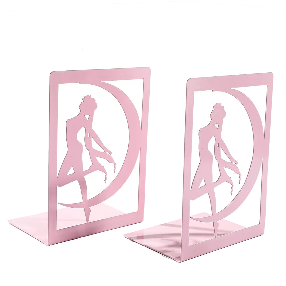 Pink bookends with silhouettes of a woman and a moon on a white background